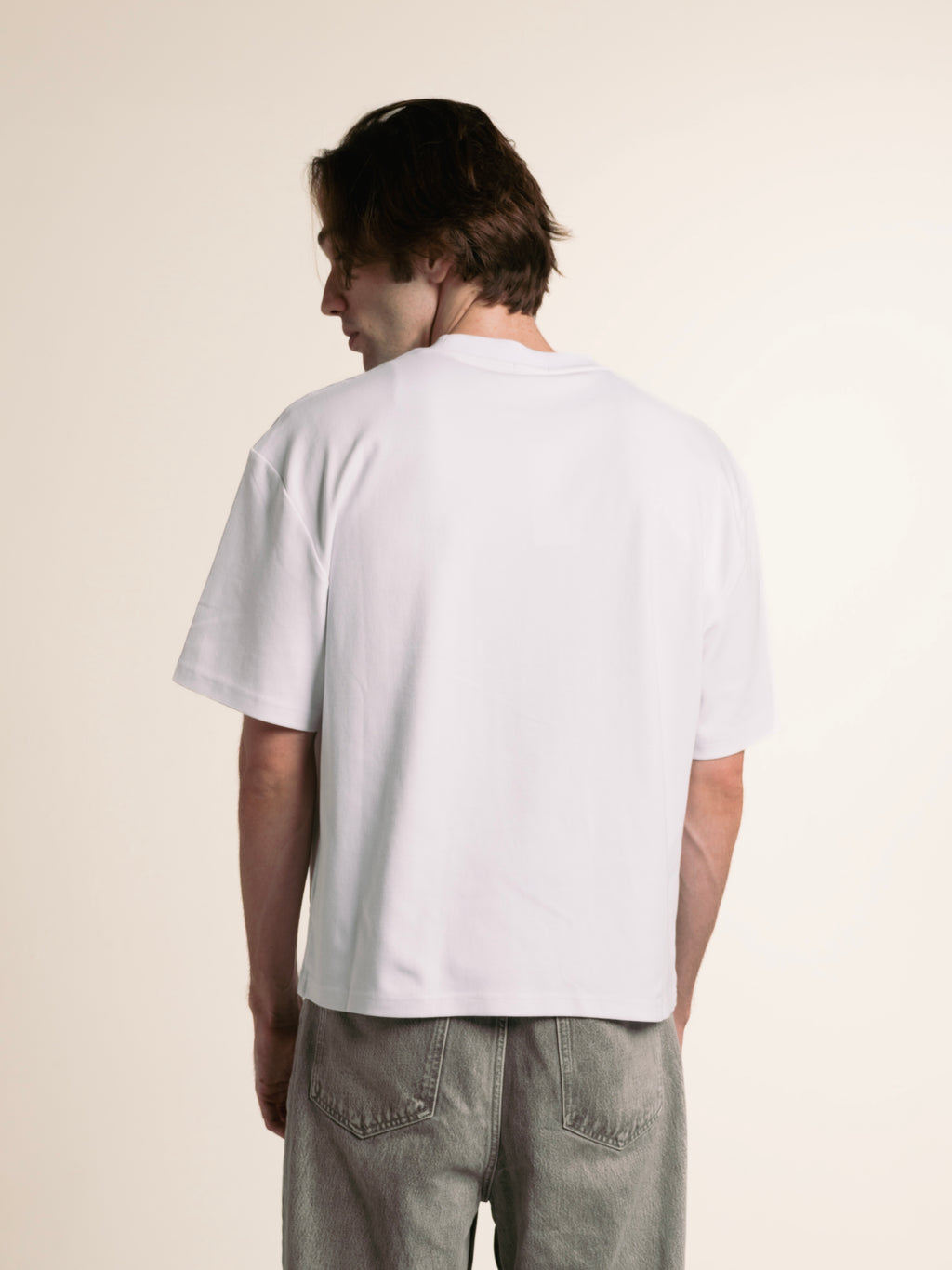 Back view of the white ORY Origin T-Shirt showing its boxy fit