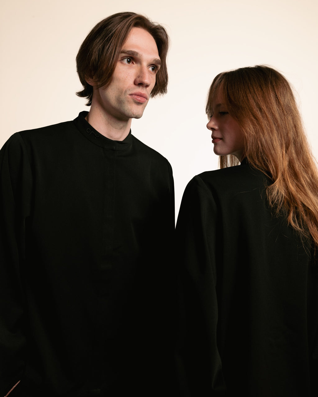 Man and woman in the black ORY Kimo Shirt, close-up