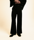 Black ORY Origin wide-leg trousers, full-length view on a male model